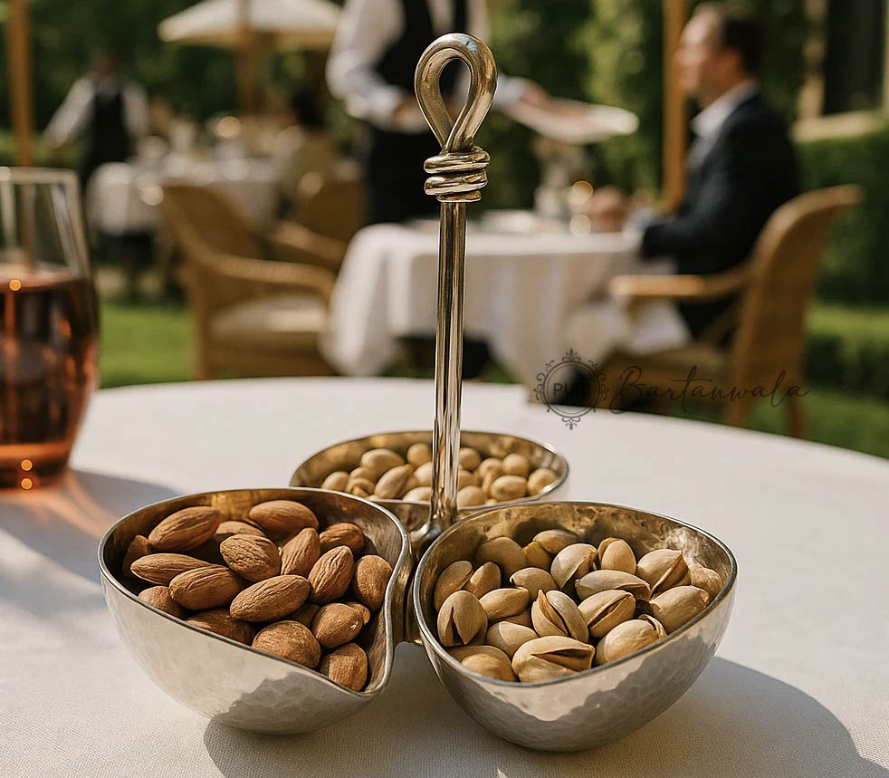 task_01k9c5kpqder0tk1nv1s6e5rtb_1762418951_img_0 Mango 3 Nuts Bowl Stand – Stainless Steel Hammered Glossy